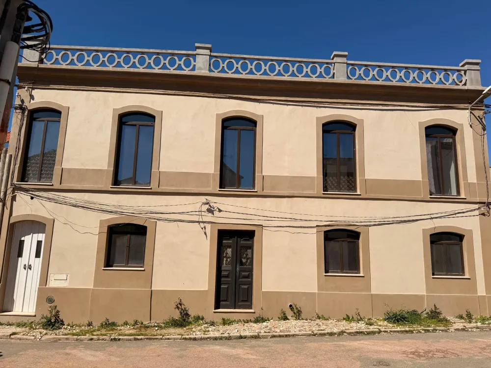 Casa Alma, an 19th century building in São Luís with arched windows and blue azulejo railing