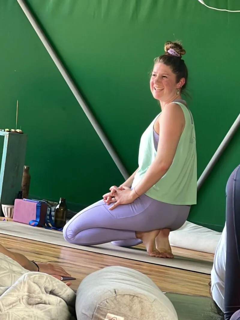 Lena Berger smiling during a class in the yoga dome